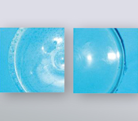 Die Vorteile des Vakuums werden oftmals erst unter dem Mikroskop sichtbar, hier am Beispiel von transparentem Silikon für eine optische Anwendung zu sehen